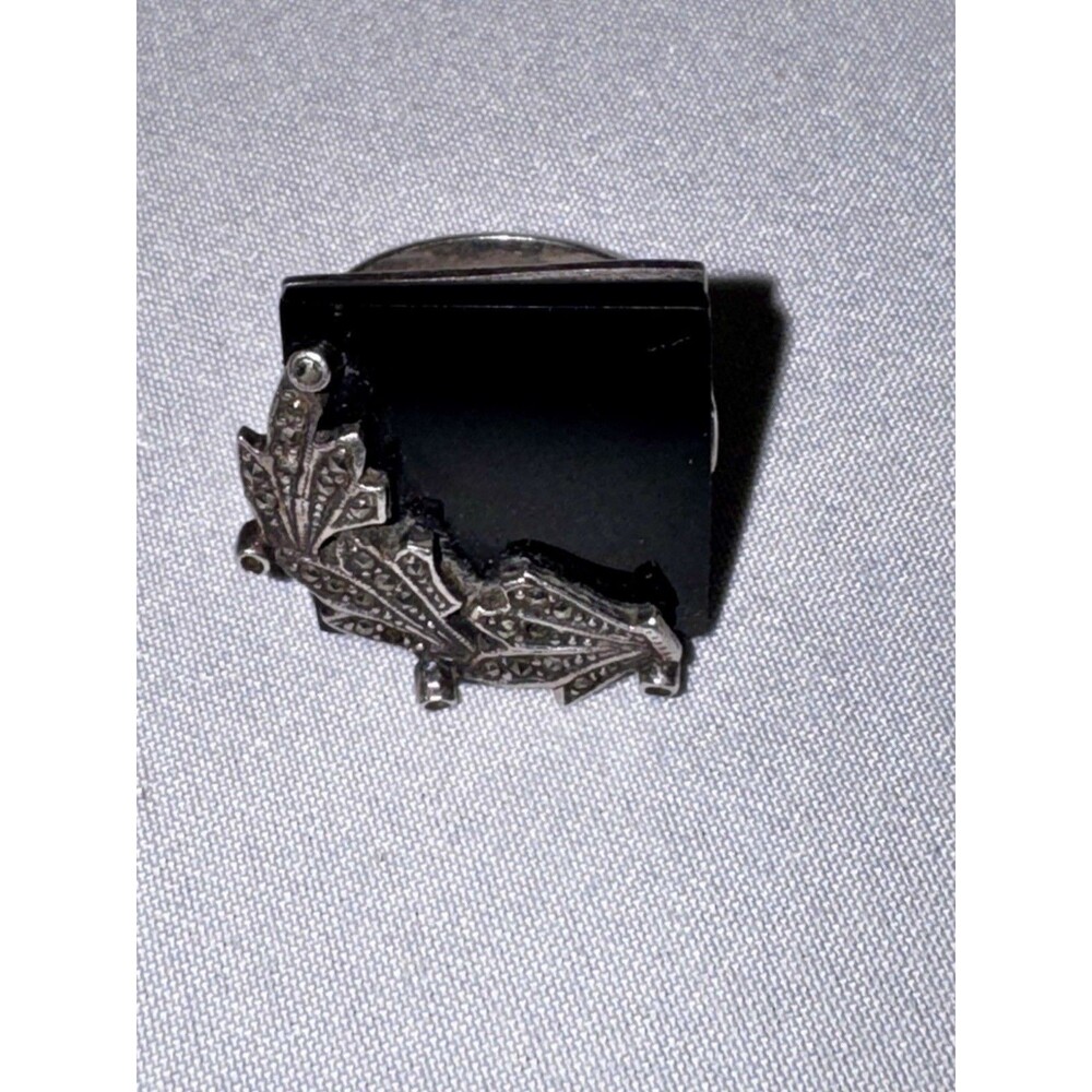 large black onyx stone .925 Ring accented by floral-detailed marcasite